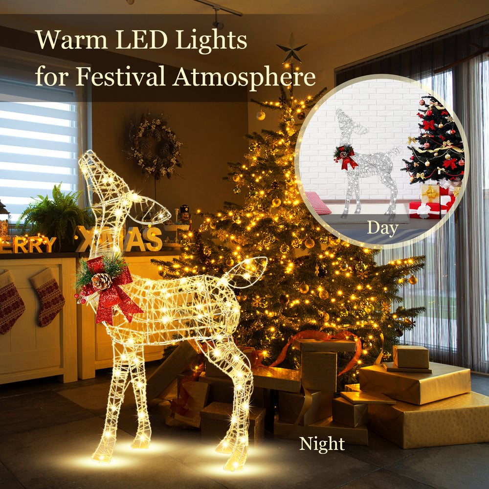 34.5-inch Christmas reindeer decoration with warm white LED lights, showcasing a red bow, ideal for cozy holiday.