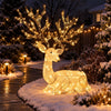 Kneeling Christmas reindeer adorned with 280 warm white LED lights, perfect for outdoor holiday decoration.