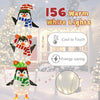 Lighted penguin decoration featuring 156 warm white lights, cute hats, and stable triangular structure for outdoor use.