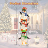 Three lighted penguins decoration with warm white lights and cute hats, measuring 6ft tall for festive outdoor display.