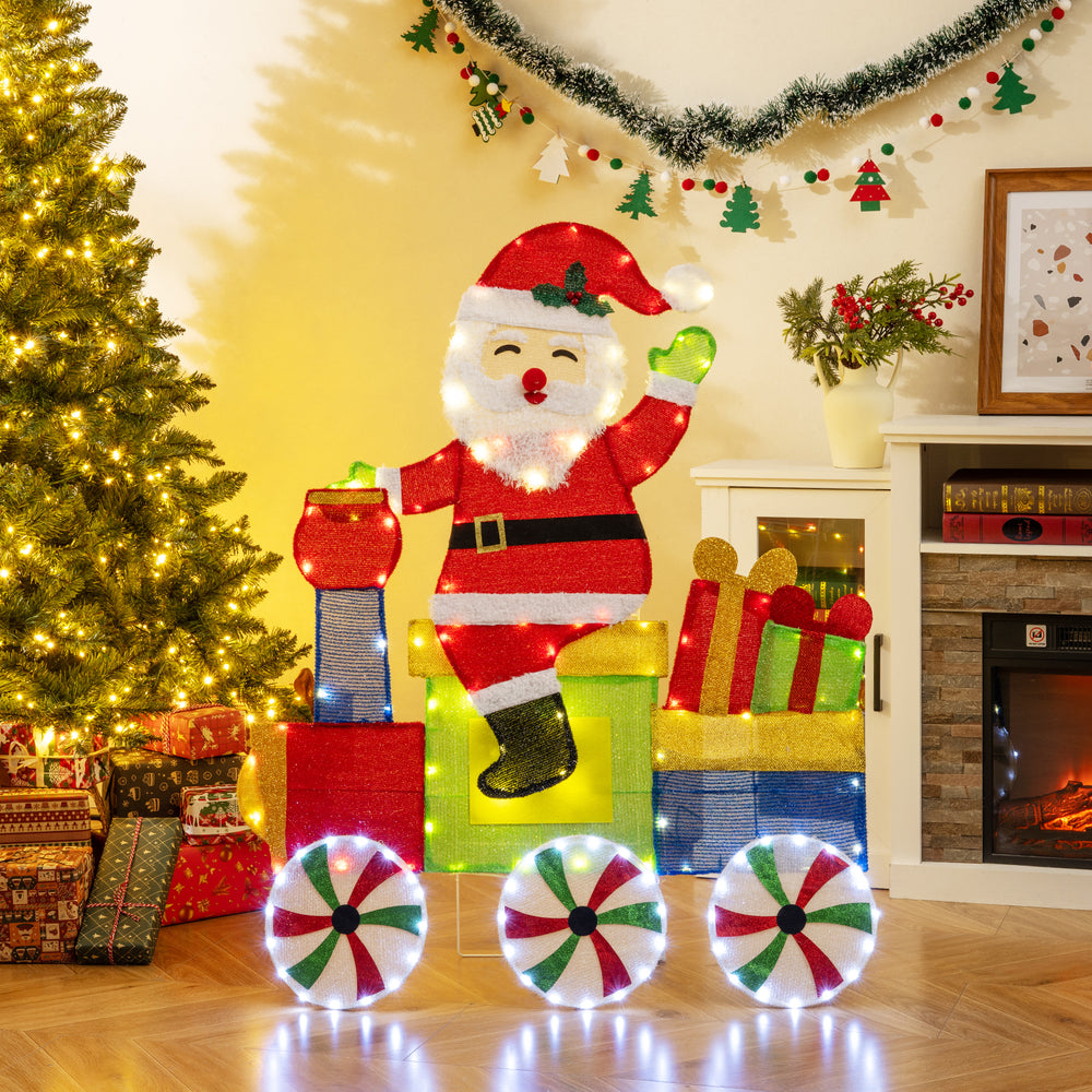 Lighted Santa on a train decoration with LED lights, featuring gift boxes and lighted wheels for festive indoor or.