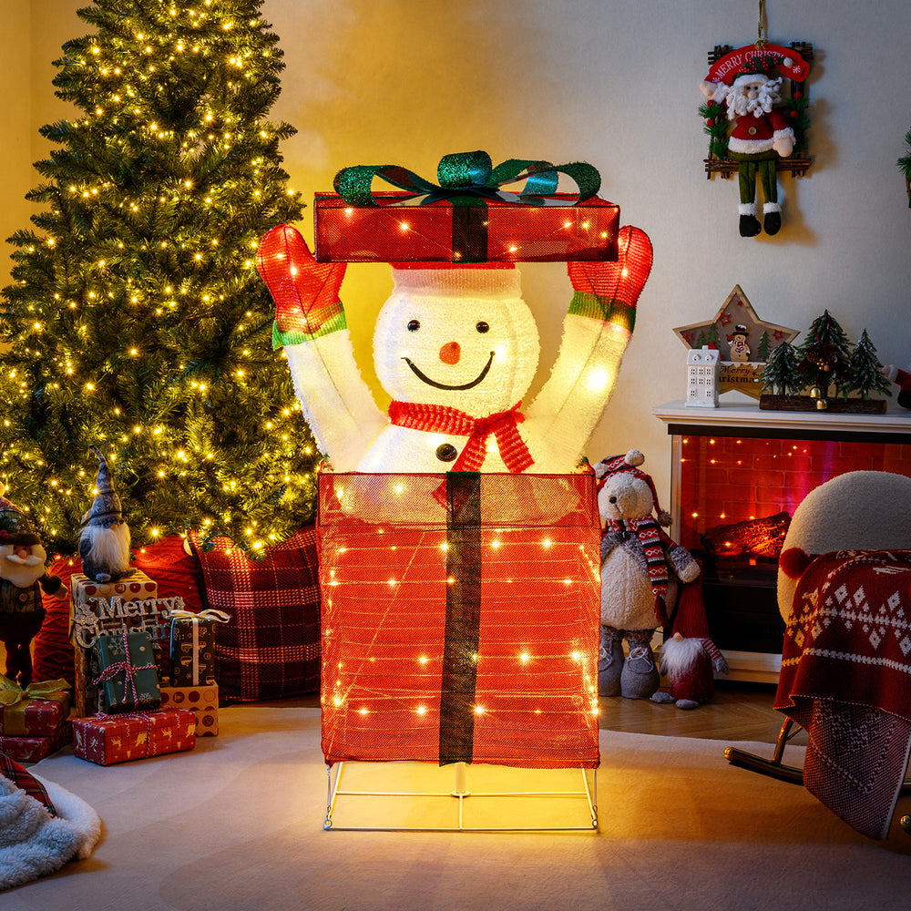 Lighted snowman in a gift box with 100 warm LED lights, perfect for indoor and outdoor Christmas decoration.
