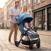 Lightweight blue baby stroller with adjustable canopy, one-hand folding, and multi-position backrest for toddlers.