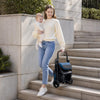 Lightweight blue baby stroller designed for toddlers includes a detachable footmuff and compact fold for easy transport.