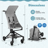 Lightweight gray baby stroller with adjustable canopy, compact folding design, and safety harness for travel.