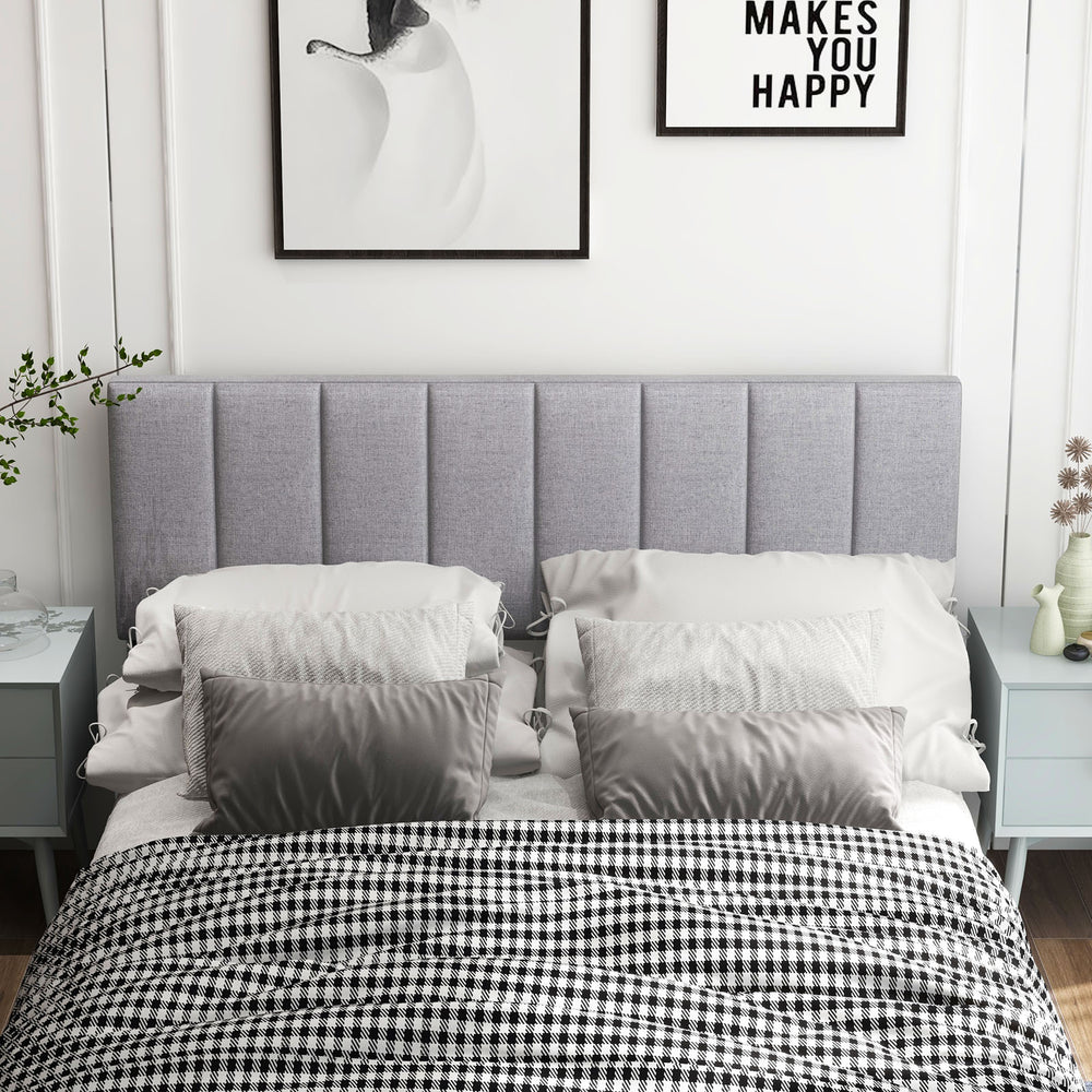 Gray linen upholstered headboard with vertical channel tufting, suitable for full and queen size bed frames, enhancing.