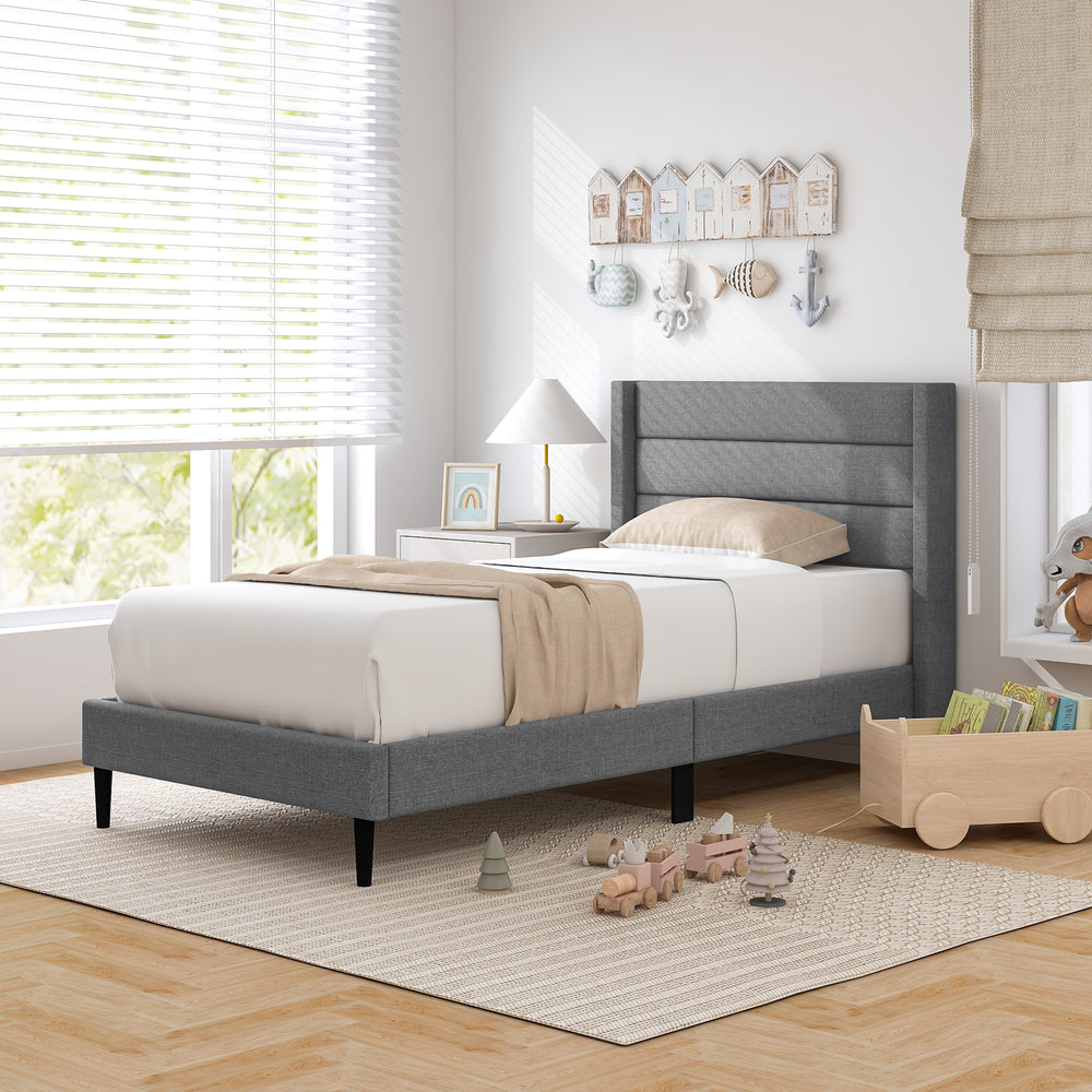 Twin size linen upholstered platform bed frame with wingback headboard, featuring a sturdy design and elegant quilting.