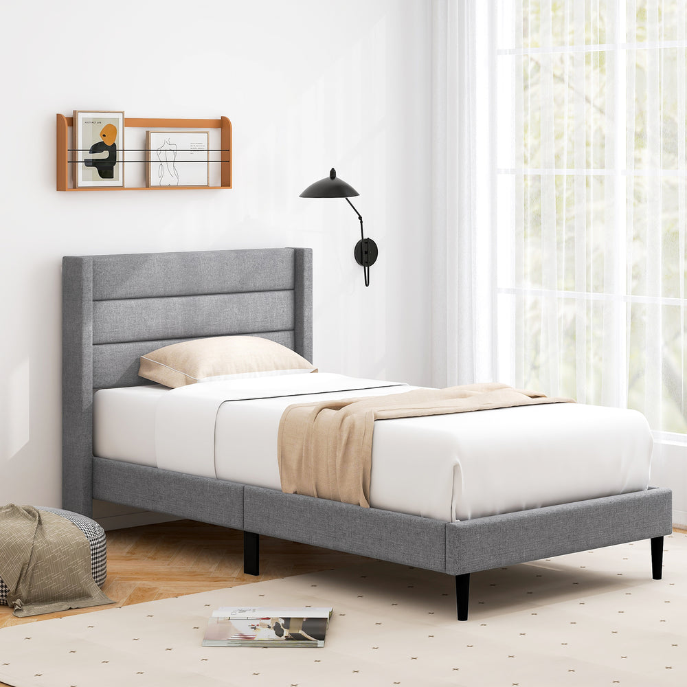 Twin size linen upholstered platform bed frame with wingback headboard, featuring durable quilting and solid wood legs.
