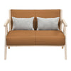 Loveseat sofa in brown artificial leather with gray throw pillows, rubber wood frame, ideal for small spaces.