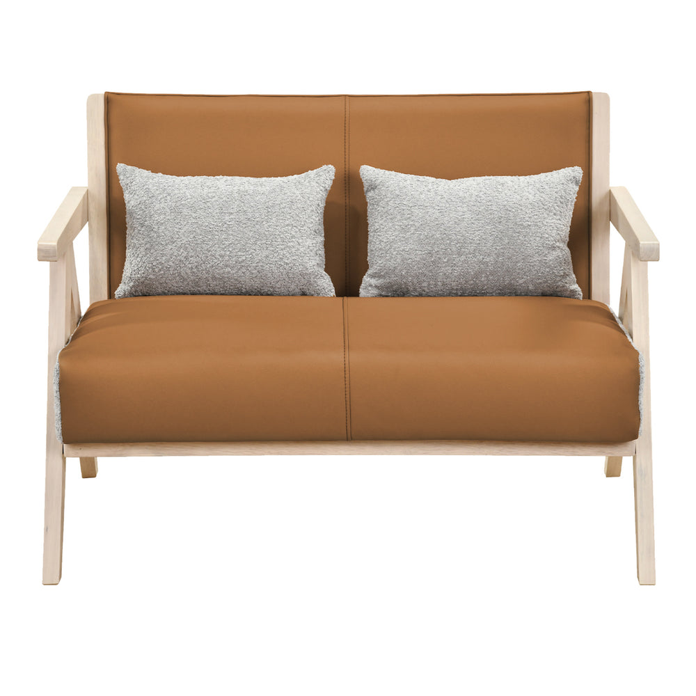 Loveseat sofa in brown artificial leather with gray throw pillows, rubber wood frame, ideal for small spaces.