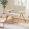 Beige loveseat sofa with armrests and wooden legs, featuring soft sherpa fabric and a slanted backrest for comfort.