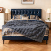 Luxury fuzzy plush rabbit fur bubble blanket in gray, showcasing soft texture on a bed for cozy warmth and style.