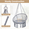 Macrame swing chair in grey with round seat cushion, sturdy metal rings, supports 330 lbs, ideal for indoor or outdoor.