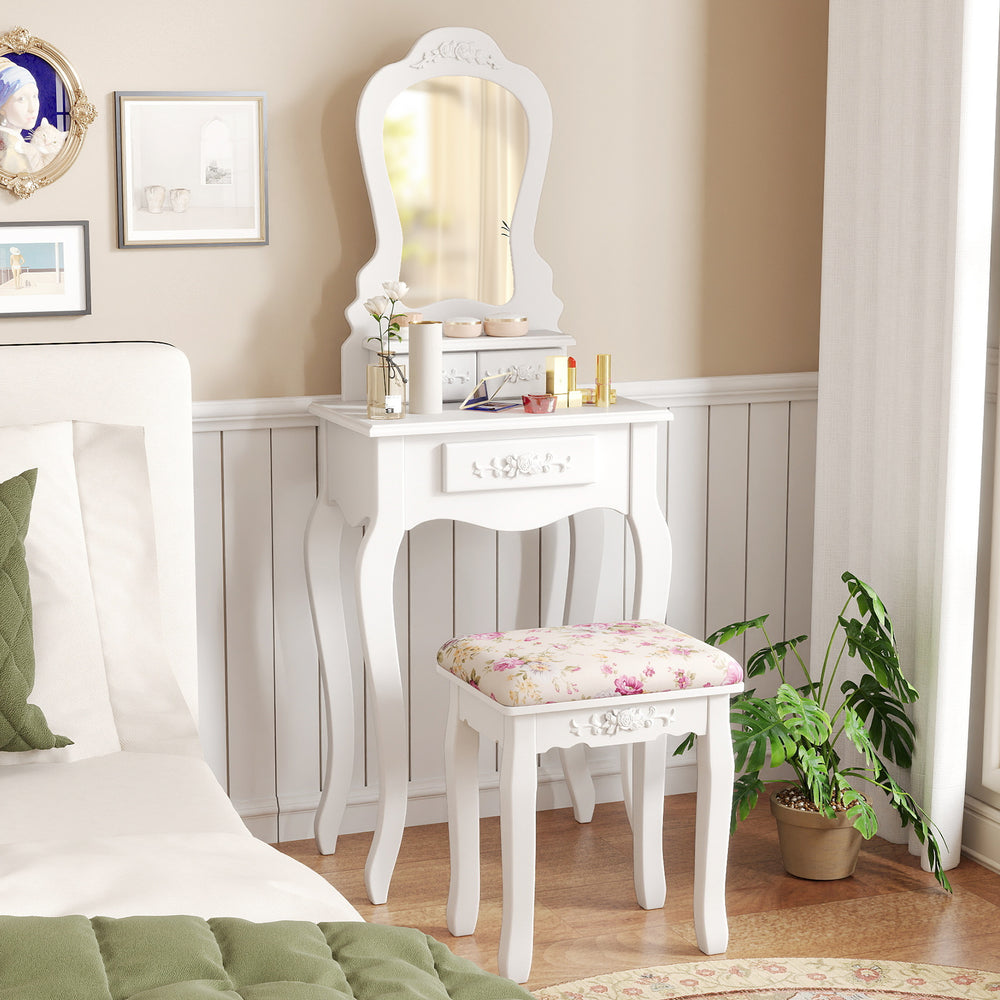Elegant white makeup dressing table with three drawers and cushioned stool, perfect for organizing cosmetics in style.