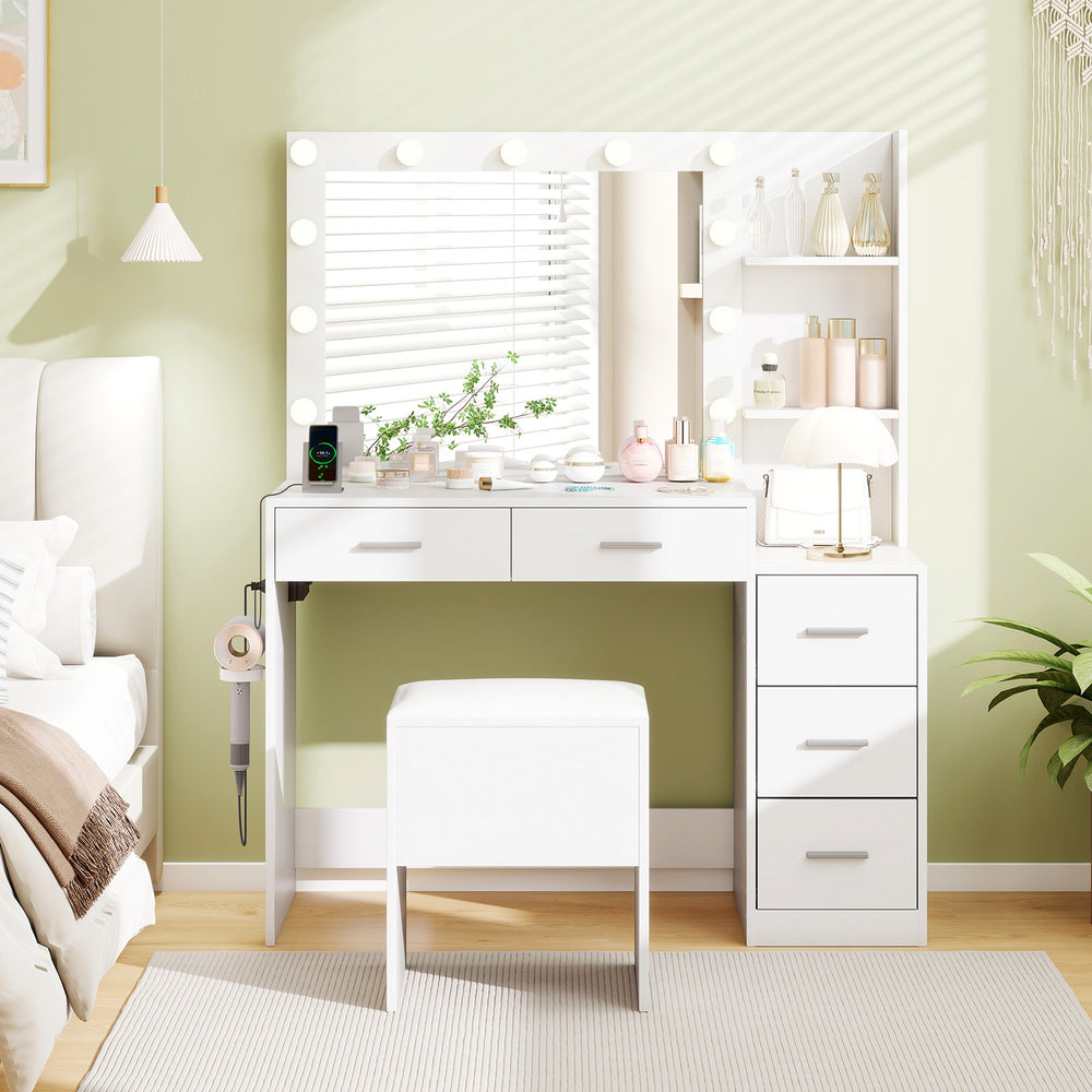 Makeup table and stool set in white with HD mirror, adjustable lighting, hair dryer stand, and ample storage for.