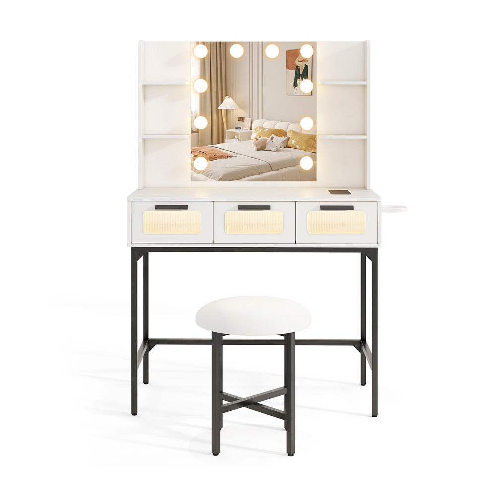Bedroom makeup vanity desk in white with Hollywood mirror, LED lights, three drawers, and padded stool for beauty.