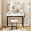 Bedroom makeup vanity desk in white with Hollywood mirror, LED lights, and padded stool for organized beauty essentials.