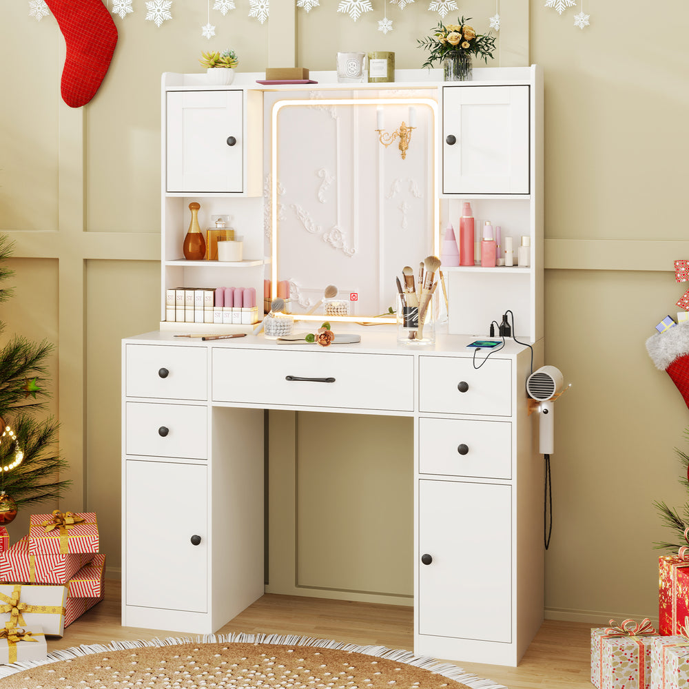 Makeup vanity desk in white with lighted mirror, storage drawers, and charging station, ideal for beauty routines.