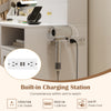 Modern makeup vanity desk with built-in charging station, featuring USB ports and AC outlets for convenient device.
