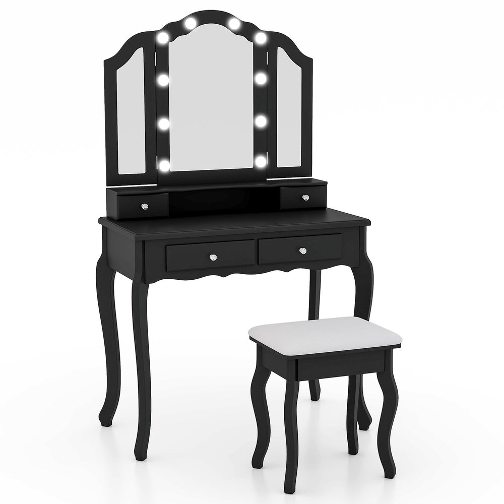 Black makeup vanity table set featuring a tri-folding lighted mirror, two drawers, and a cushioned stool for comfort.