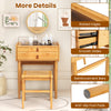 Bamboo makeup vanity table with movable mirror, tempered glass top, and two storage drawers for compact spaces.
