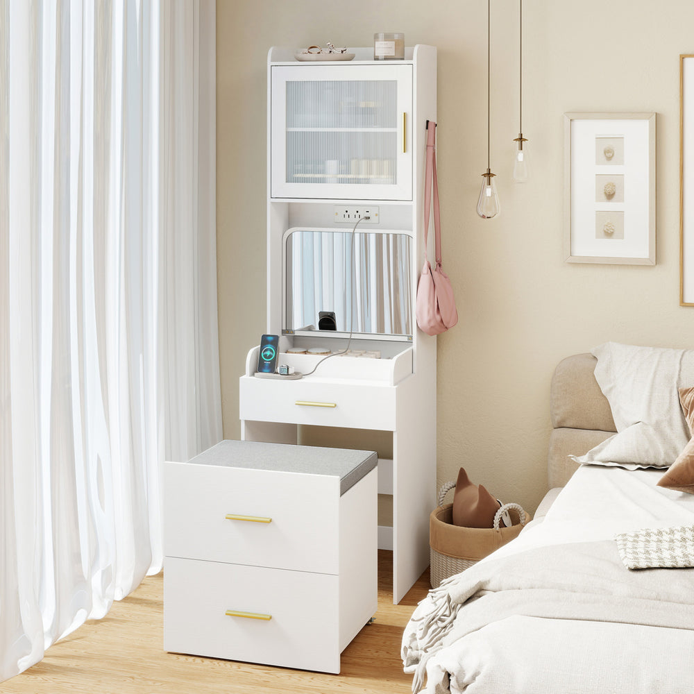 Makeup vanity with flip-top mirror, power outlets, and storage stool in white, perfect for organizing beauty essentials.