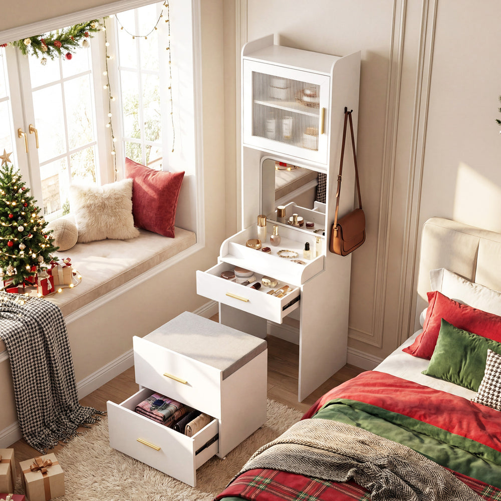 Makeup vanity in white with flip-top mirror, storage stool, and integrated power outlets for organized beauty.