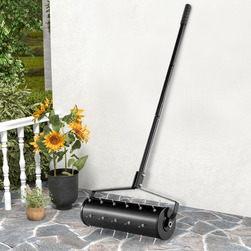 Manual lawn aerator with detachable handle, 21 inches, featuring rustproof spikes for effective soil loosening.