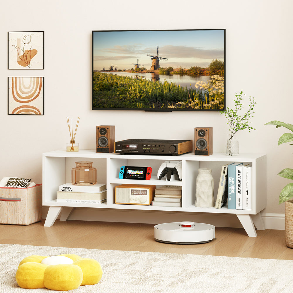 Media TV console table in white with raised support legs, featuring open compartments for storage and modern style.