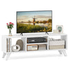 Media TV console table in white with raised support legs, featuring open compartments for storage and modern design.