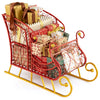 Red metal Christmas Santa sleigh basket with gifts, featuring a golden base and ample storage for holiday decorations.
