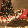 Metal Christmas Santa sleigh basket filled with colorful gifts, perfect for festive storage and holiday decor.