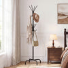 Freestanding black metal coat rack with 16 hooks and 4 legs, perfect for organizing outerwear in entryways or bedrooms.