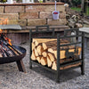 Metal firewood rack with dual handles, designed for outdoor use, featuring a moose design and elevated for wood dryness.