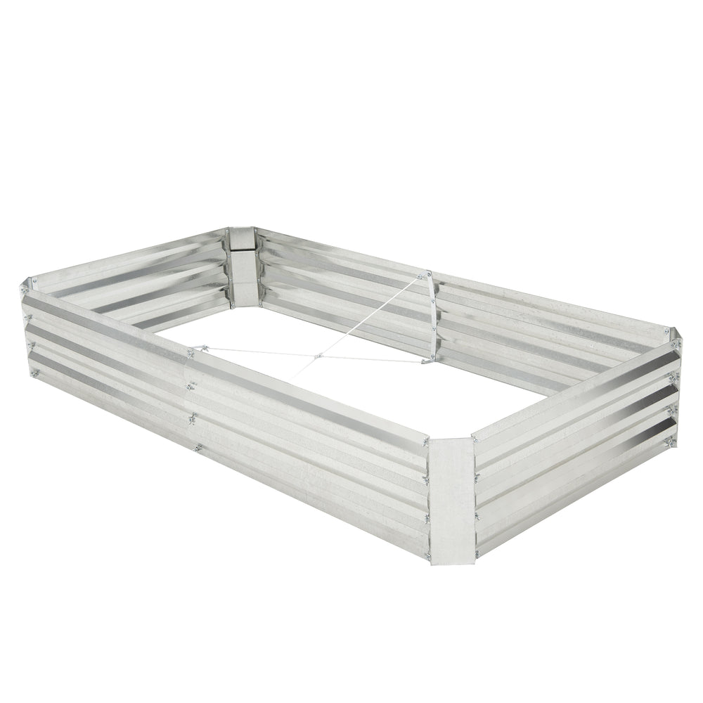 Metal galvanized raised garden bed with open-ended base, 6 x 3 ft, durable and weatherproof for cultivating plants.