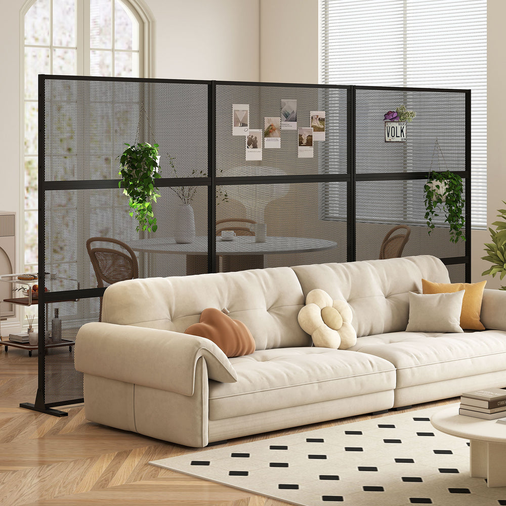 Metal privacy screen in black with mesh surface, ideal for indoor use and enhancing privacy in living spaces.