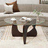 Triangle coffee table with a stylish tempered glass top and walnut rubber wood base, perfect for magazines and drinks.