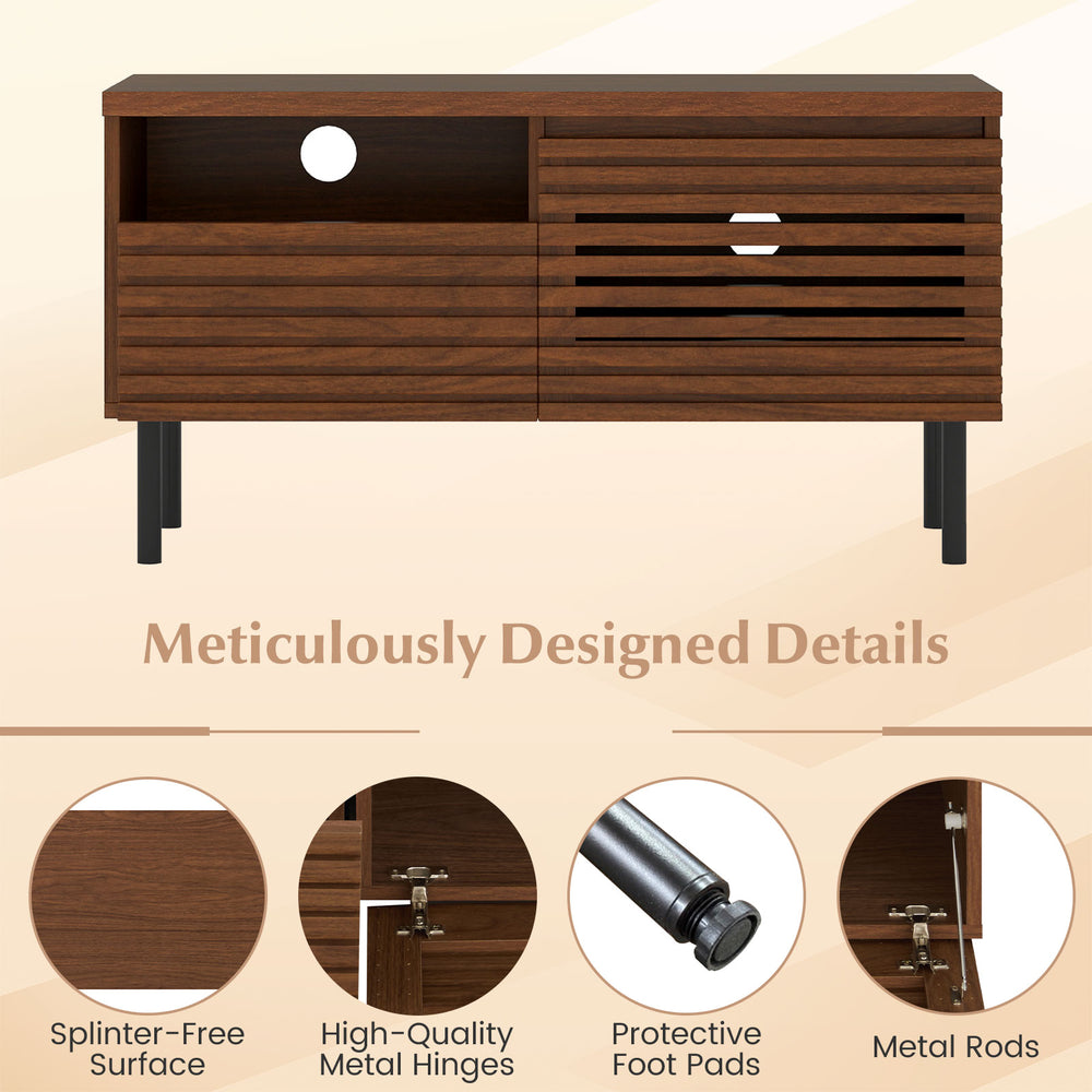 Mid Century fluted TV stand in walnut with open compartment, drawer, and metal legs for modern entertainment setups.