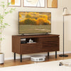 Mid Century fluted TV stand in walnut with open compartment, spacious drawer, and solid metal legs for modern interiors.