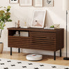 Mid Century fluted TV stand in walnut with open compartment and drawer, perfect for a modern entertainment center.