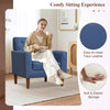 Mid Century Modern accent chair in blue faux leather with button tufting, ideal for living rooms and home offices.
