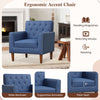 Mid Century Modern accent chair in blue with button tufted design, wide backrest, and supportive armrests for comfort.