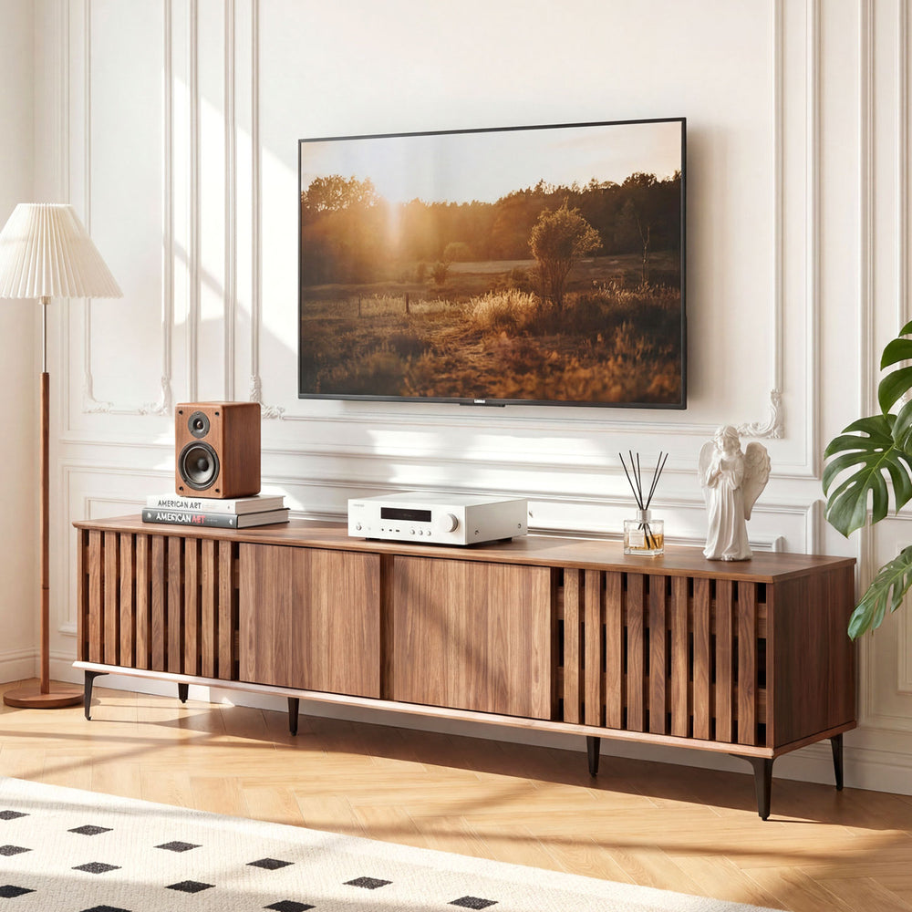 Mid-century modern entertainment center in walnut with 4 storage cabinets, ideal for TVs up to 80", enhancing living.