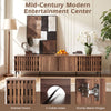 Mid-century modern entertainment center in walnut with slatted doors, 4 storage cabinets, and cable management holes.