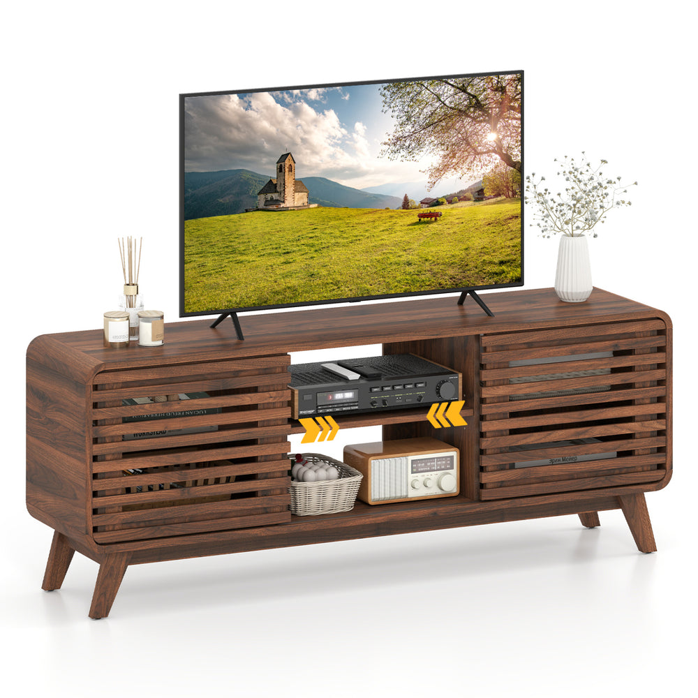 Mid Century Modern entertainment center in walnut with grille-style sliding doors, perfect for living room media.