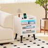 Mid Century Modern nightstand in white showcases a tidy design with an illuminated shelf, remote-controlled lighting, and ample storage.