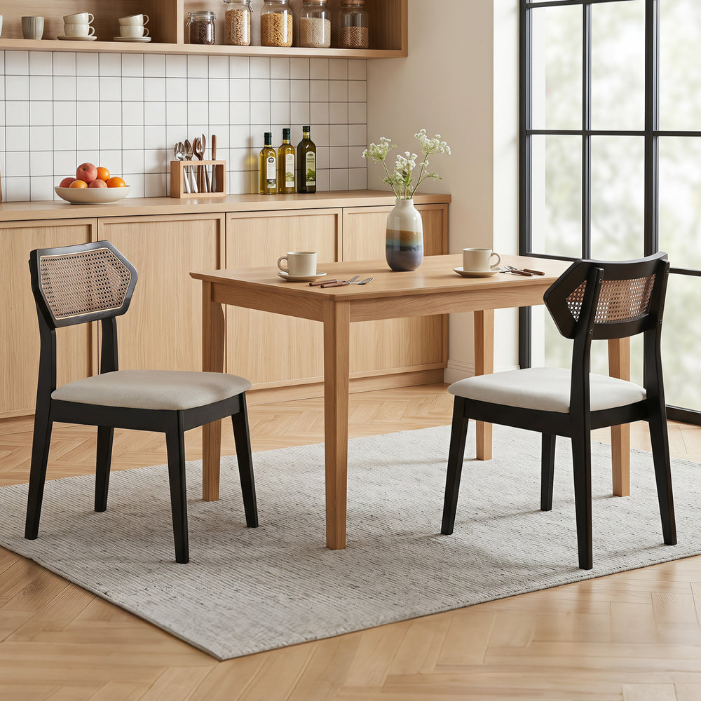 Mid Century Rattan Dining Chairs set features a black frame and woven rattan back, perfect for kitchens or dining rooms.