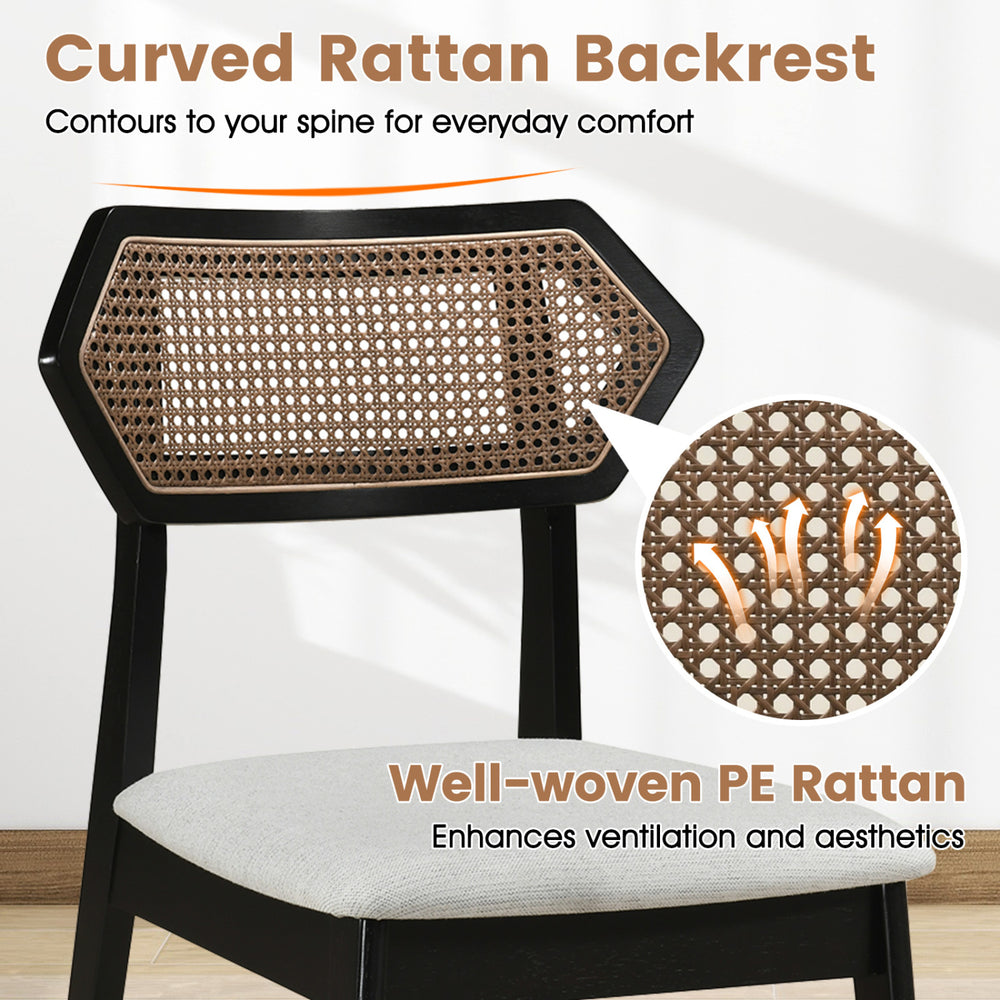 Curved rattan backrest of a Mid Century dining chair set enhances comfort and ventilation, perfect for dining spaces.