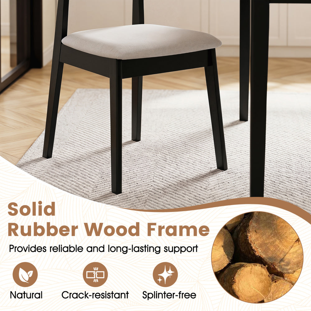 Mid Century dining chair features a solid rubber wood frame and breathable fabric for comfortable seating in any dining space.