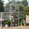 Portable mini greenhouse with 5 tier shelves, rustproof frame, and roll-up door, perfect for balcony plant growth.